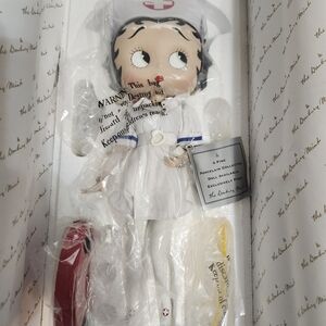 Danbury Mint Nurse Doll with White and Red Accents